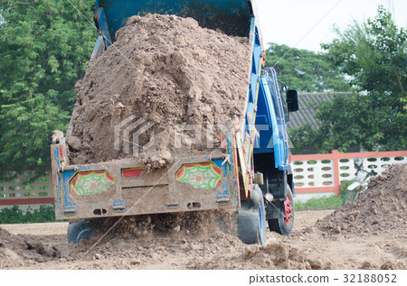 Dump truck to soil to improve the soil. For constr Dump truck to soil to improve the soil. For constr 32188052