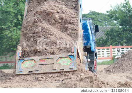 Dump truck to soil to improve the soil. For constr Dump truck to soil to improve the soil. For constr 32188054