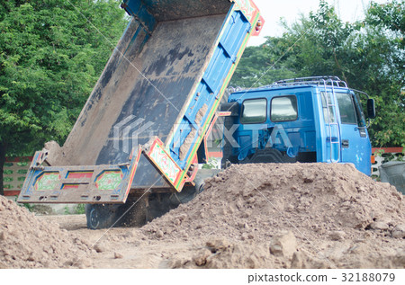 Dump truck to soil to improve the soil. For constr Dump truck to soil to improve the soil. For constr 32188079