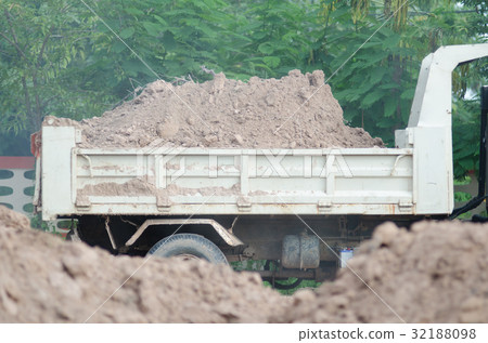 Dump truck to soil to improve the soil. For constr Dump truck to soil to improve the soil. For constr 32188098