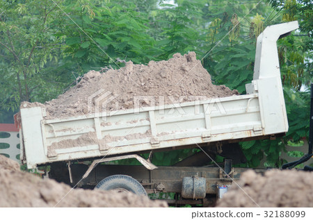 Dump truck to soil to improve the soil. For constr Dump truck to soil to improve the soil. For constr 32188099