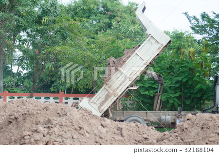 Dump truck to soil to improve the soil. For constr Dump truck to soil to improve the soil. For constr 32188104