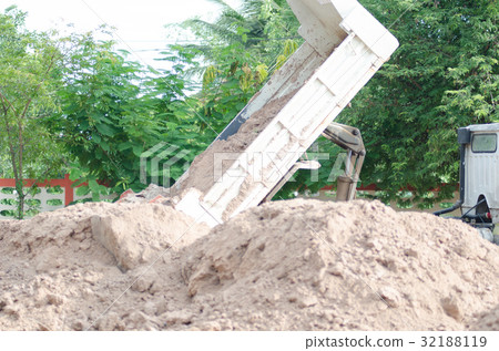 Dump truck to soil to improve the soil. For constr Dump truck to soil to improve the soil. For constr 32188119
