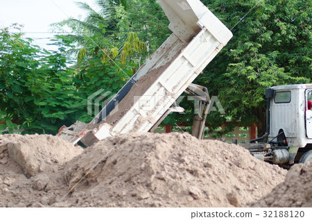 Dump truck to soil to improve the soil. For constr Dump truck to soil to improve the soil. For constr 32188120