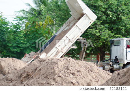 Dump truck to soil to improve the soil. For constr Dump truck to soil to improve the soil. For constr 32188121