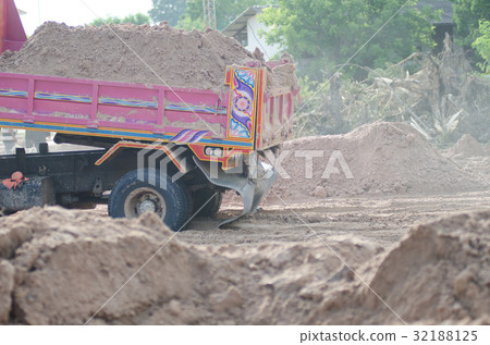 Dump truck to soil to improve the soil. For constr Dump truck to soil to improve the soil. For constr 32188125