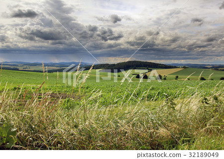 Countryside with rainy clouds 32189049