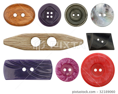 Various old and used buttons on white background 32189060