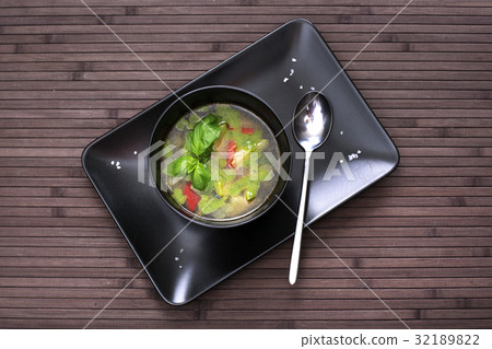 Tuscan vegetable soup with basil pesto 32189822