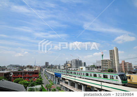 Flowing cloud and Tokyo Metro Chiyoda Line 16000 series train 32189984