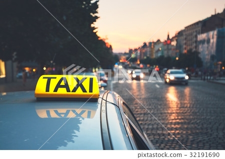 Taxi car on the city street Taxi car on the city street 32191690