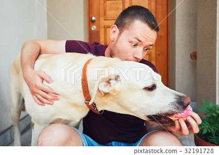Naughty dog and donut 32191728