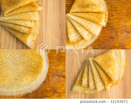 Thin Pancakes on a Wooden Background Top View Thin Pancakes on a Wooden Background Top View 32193071