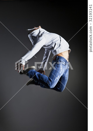 Dancer posing in front of the studio background 32193141