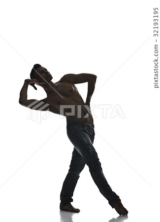 Silhouette of a young man dancer isolated 32193195