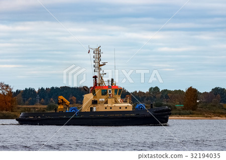 Tug ship in port Tug ship in port 32194035