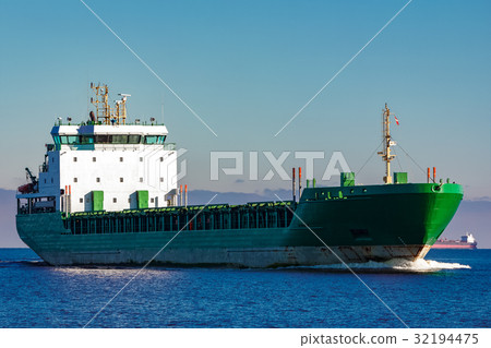 Green cargo ship 32194475