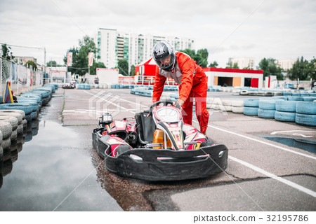 Kart racer on start line, go cart driver 32195786