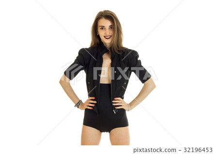 Slim beautiful girl in black body stands in the Slim beautiful girl in black body stands in the 32196453