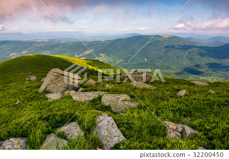 rocks on grassy hillside of Carpathian mountains rocks on grassy hillside of Carpathian mountains 32200450