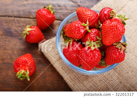 Ripe strawberry on burlap Ripe strawberry on burlap 32201317