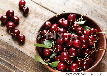 Cherries on a wooden background Cherries on a wooden background 32201390