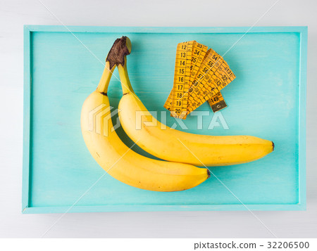 Two bananas with measuring meter Two bananas with measuring meter 32206500