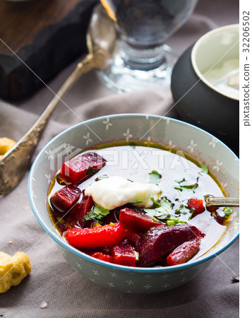 Beetroot soup served in bowls on napkin Beetroot soup served in bowls on napkin 32206502