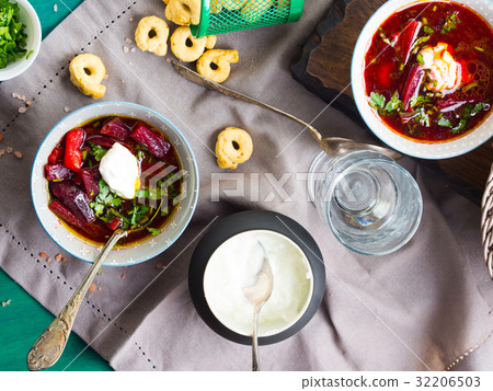 Beetroot soup served in bowls on napkin Beetroot soup served in bowls on napkin 32206503
