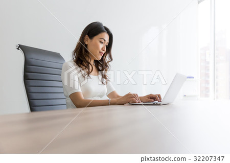 Computer and young woman 23 32207347