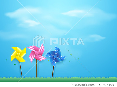 Windmills blowing in the wind on blue sky. 32207495