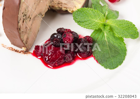 Delicious foie gras covered with dark chocolate. 32208043