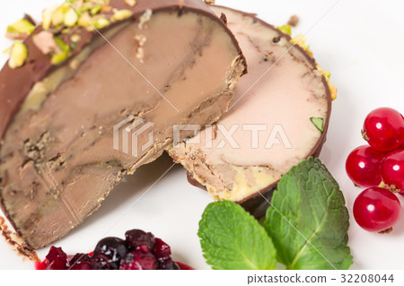Delicious foie gras covered with dark chocolate. Delicious foie gras covered with dark chocolate. 32208044
