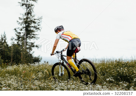 male cyclist mountain biking 32208157