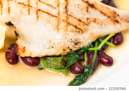 Delicious baked dorado fillet with chard. Delicious baked dorado fillet with chard. 32208366