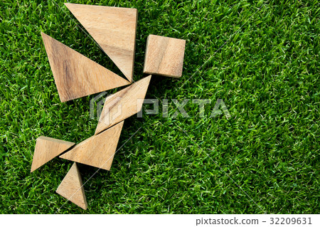 Wooden tangram puzzle in fairy or angel shape 32209631