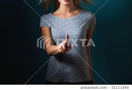 Young woman pointing something Young woman pointing something 32211848