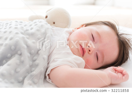 Little baby boy sleeping 32211858