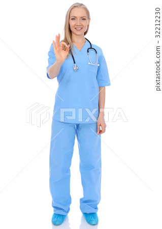 Smiling young nurse showing Ok sign isolated over 32212230