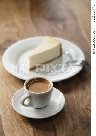 fresh espresso and cheesecake on table fresh espresso and cheesecake on table 32212479