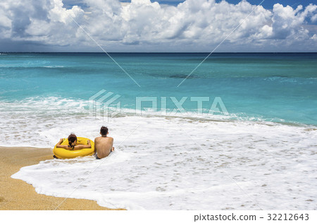 Vacation couple on beach together Vacation couple on beach together 32212643
