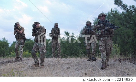 Military troop exploring territory Military troop exploring territory 32214920