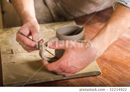 pottery, stoneware, ceramics art concept - closeup 32214922