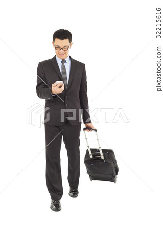 businessman walking and using phone   32215616
