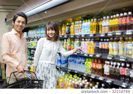 Shopping at the supermarket drinks department Shopping at the supermarket drinks department 32218789