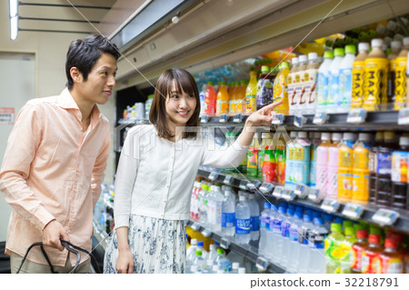 Shopping at the supermarket drinks department Shopping at the supermarket drinks department 32218791