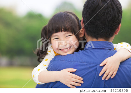 happy little girl hugging embracing her father 32219896