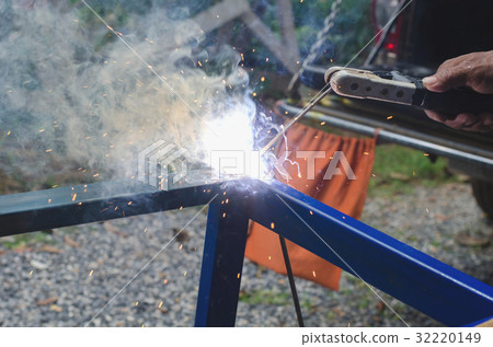 Industrial Worker at the factory welding closeup  32220149