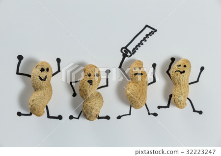 Four peanuts figurine having fun with saw Four peanuts figurine having fun with saw 32223247