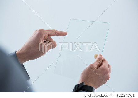 Businessman touching an glass sheet 32224761